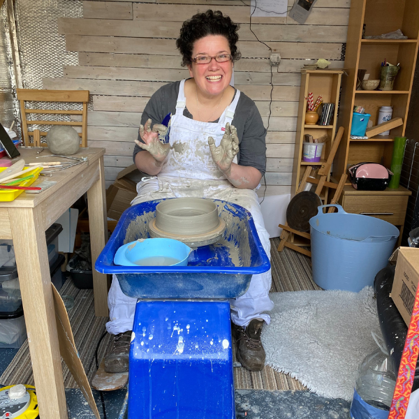Melonbox Training & Consultancy - a picture of the business owner, Di, on a potters wheel!
